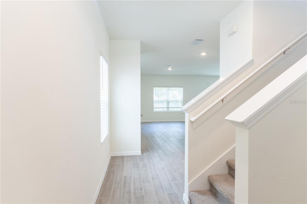 4807 Southwest 51st Terrace Gainesville, FL 32608 - Photo 5 of 35 a view of entryway with wooden floor