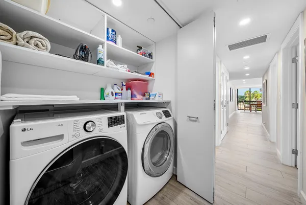 a view of washer and dryer in a utility room