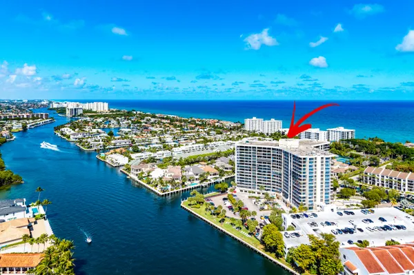 a view of city with ocean