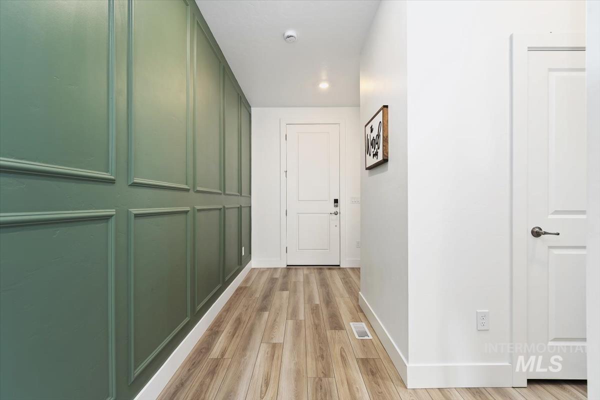 14361 Fractus Drive Caldwell, ID 83607 - Photo 21 of 50 Corridor with light wood-type flooring and recessed lighting