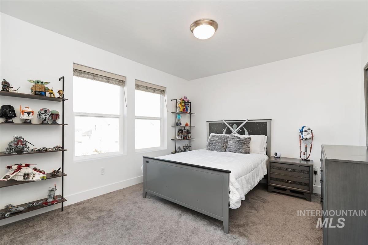 14361 Fractus Drive Caldwell, ID 83607 - Photo 22 of 50 Bedroom with light carpet