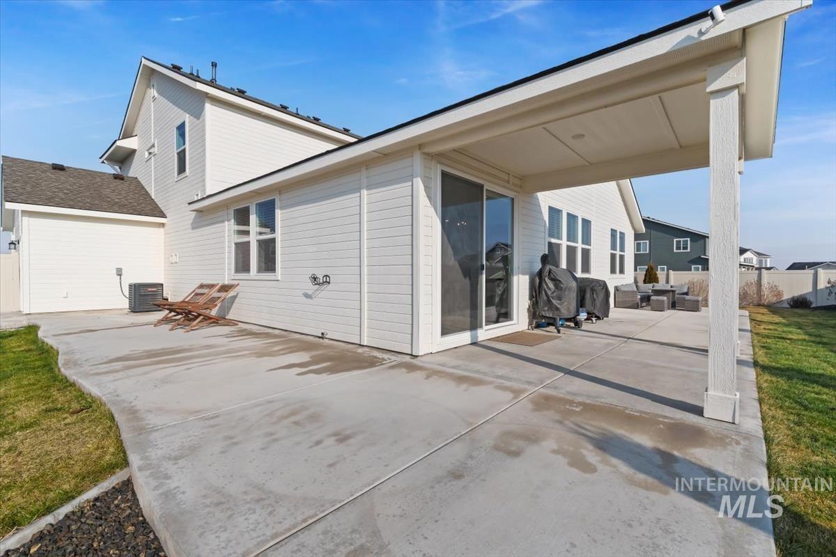14361 Fractus Drive Caldwell, ID 83607 - Photo 30 of 50 Back of house with a patio area