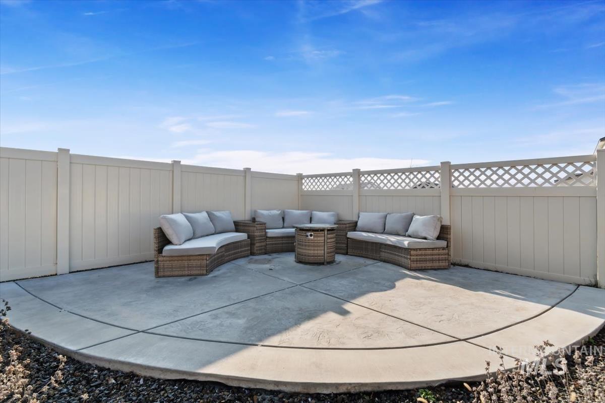 14361 Fractus Drive Caldwell, ID 83607 - Photo 32 of 50 Fenced backyard featuring a patio area