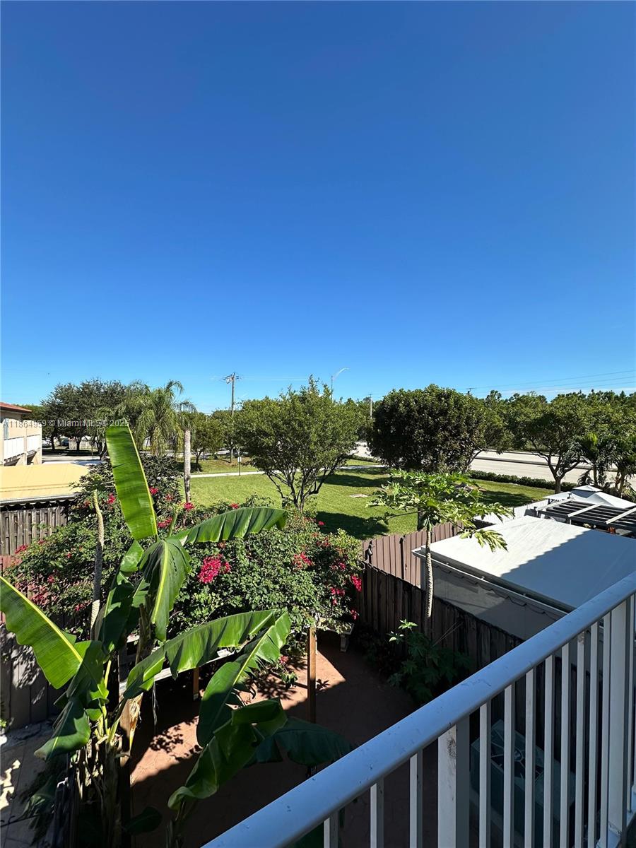 13713 Southwest 171st Lane Miami, FL 33177 - Photo 17 of 18 a view of a lake and outdoor space