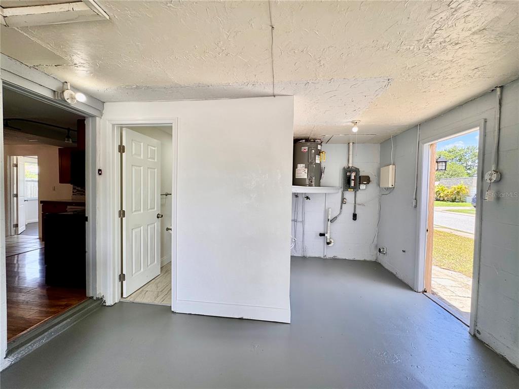 3902 Glissade Drive New Port Richey, FL 34652 - Photo 21 of 26 a view of an empty room with a window
