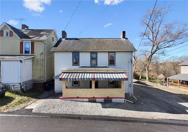 a view of a house with a balcony