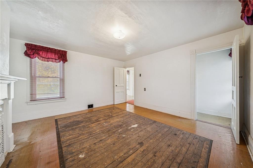 1280 Armstrong Street Irwin, PA 15642 - Photo 14 of 36 a view of an empty room and window