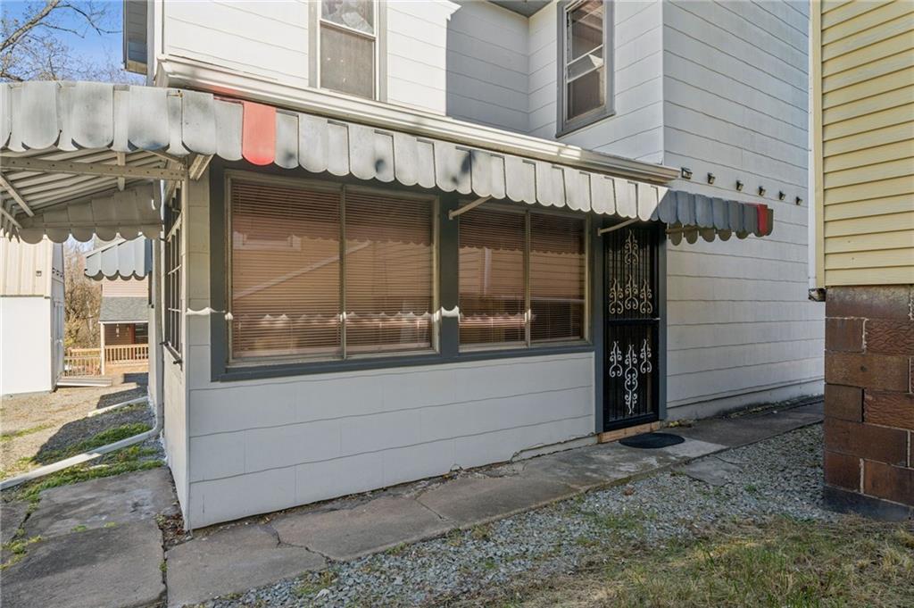 1280 Armstrong Street Irwin, PA 15642 - Photo 28 of 36 a view of a street with door