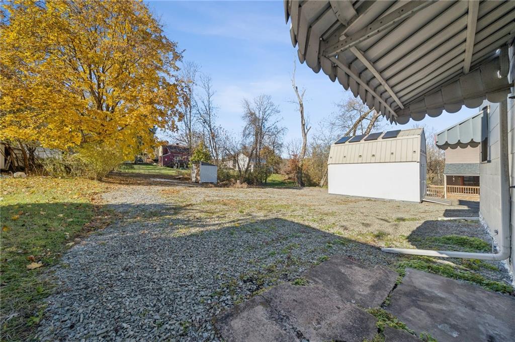 1280 Armstrong Street Irwin, PA 15642 - Photo 31 of 36 a view of a yard with yellow lighting