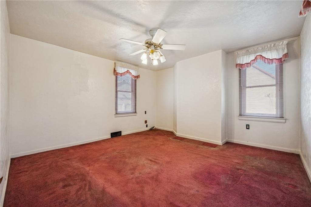 1280 Armstrong Street Irwin, PA 15642 - Photo 6 of 36 a view of an empty room with a window