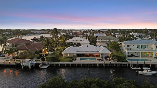 an aerial view of a city with ocean view