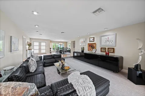 a living room with furniture or couch and a window