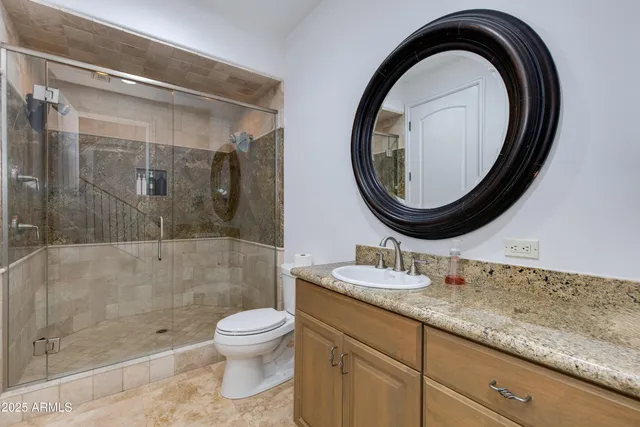 a bathroom with a sink toilet and tub