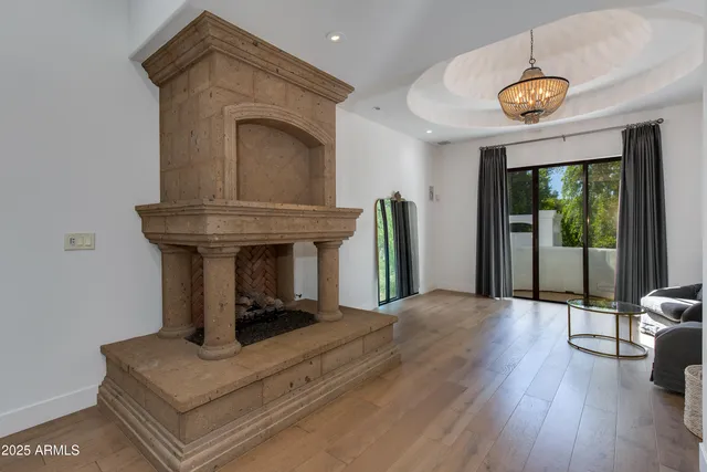 a view of living room with furniture and a window