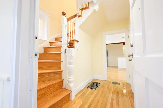 a bathroom with a tub and shower