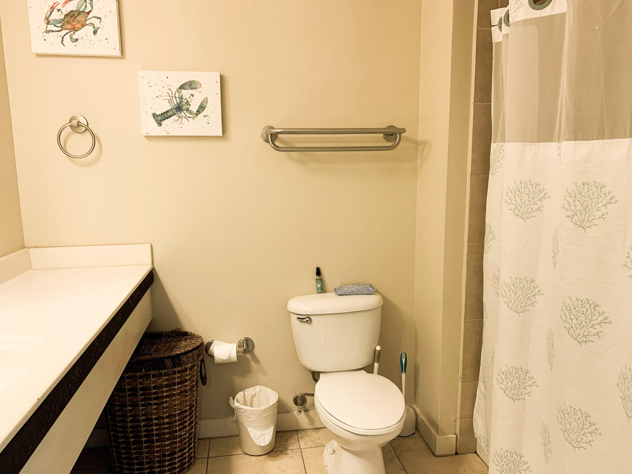 15100 Front Beach Road, Unit 919 921 Panama City Beach, FL 32413 - Photo 14 of 49 a bathroom with a toilet and a shower curtain