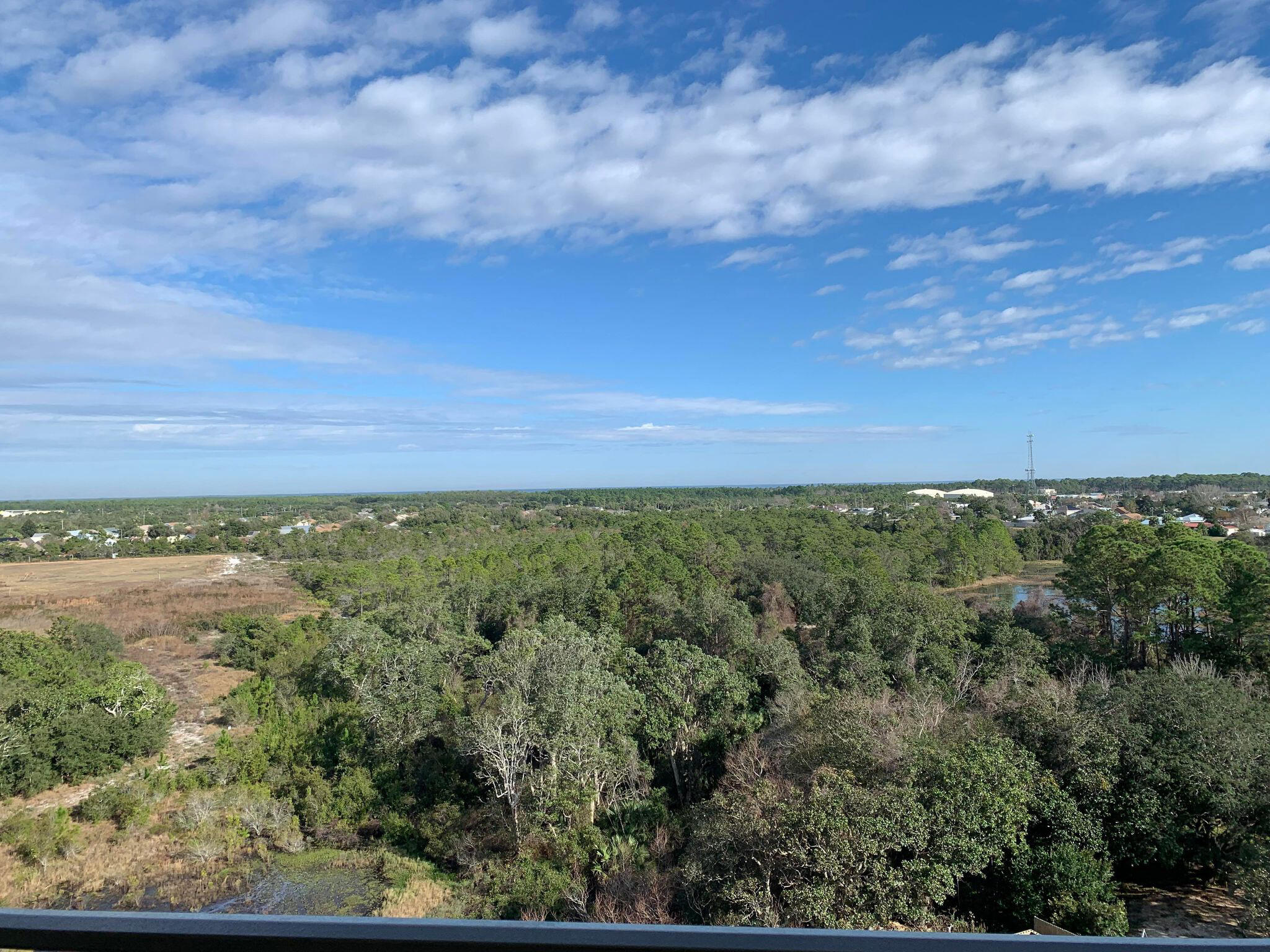 15100 Front Beach Road, Unit 919 921 Panama City Beach, FL 32413 - Photo 16 of 49 a view of a big yard