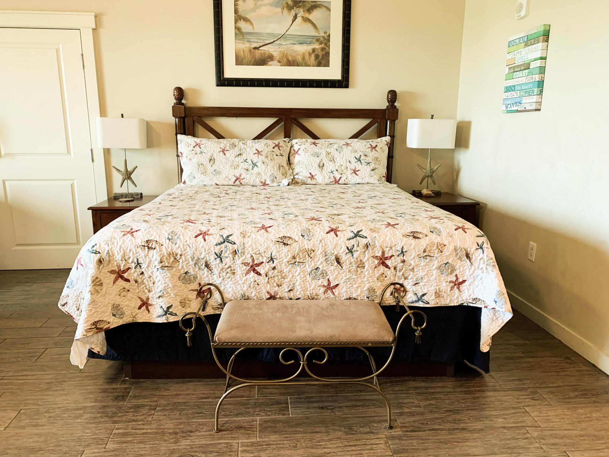 15100 Front Beach Road, Unit 919 921 Panama City Beach, FL 32413 - Photo 2 of 49 a bed sitting in a bedroom next to a window