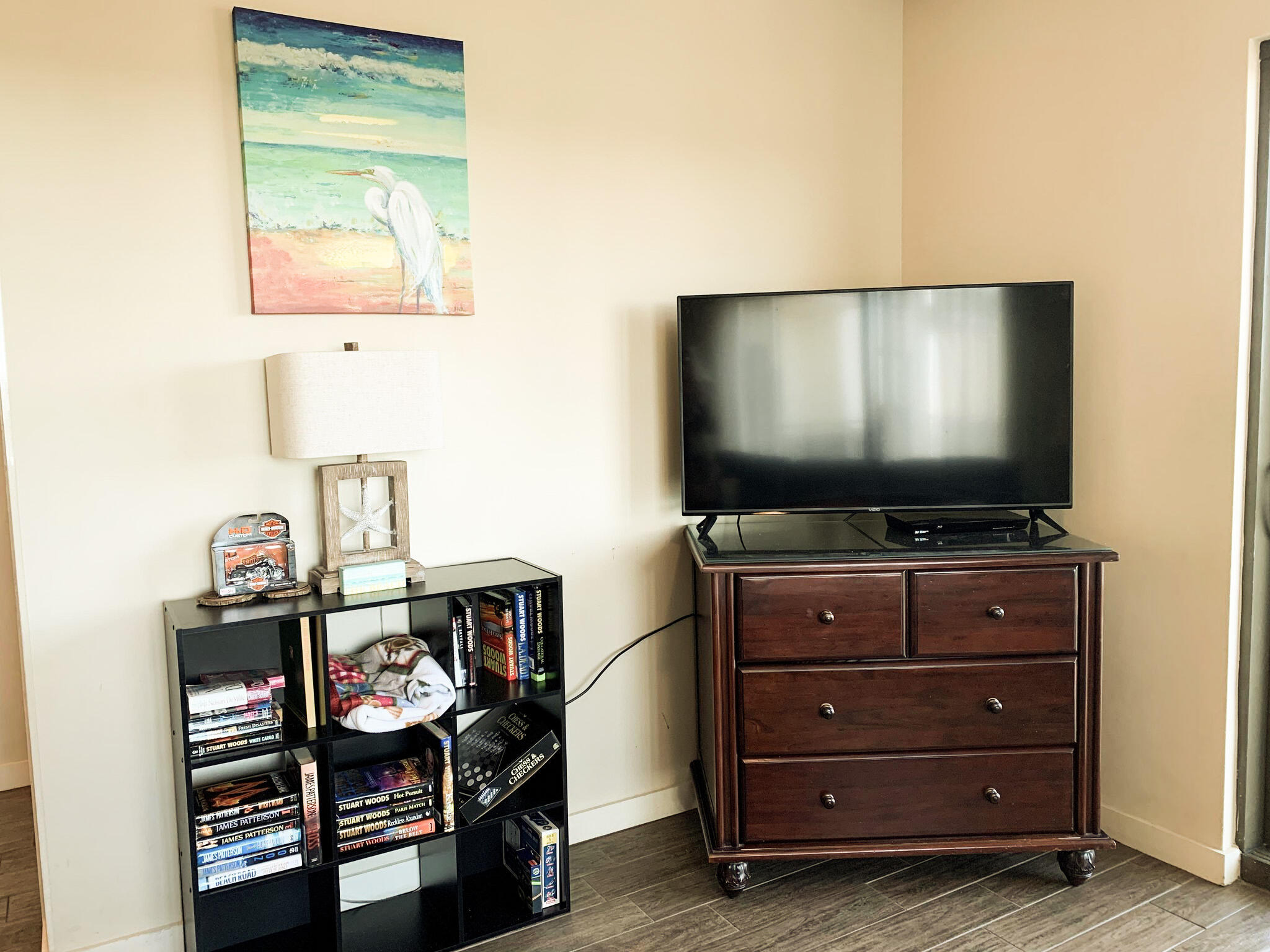 15100 Front Beach Road, Unit 919 921 Panama City Beach, FL 32413 - Photo 23 of 49 a room with furniture and flat screen tv