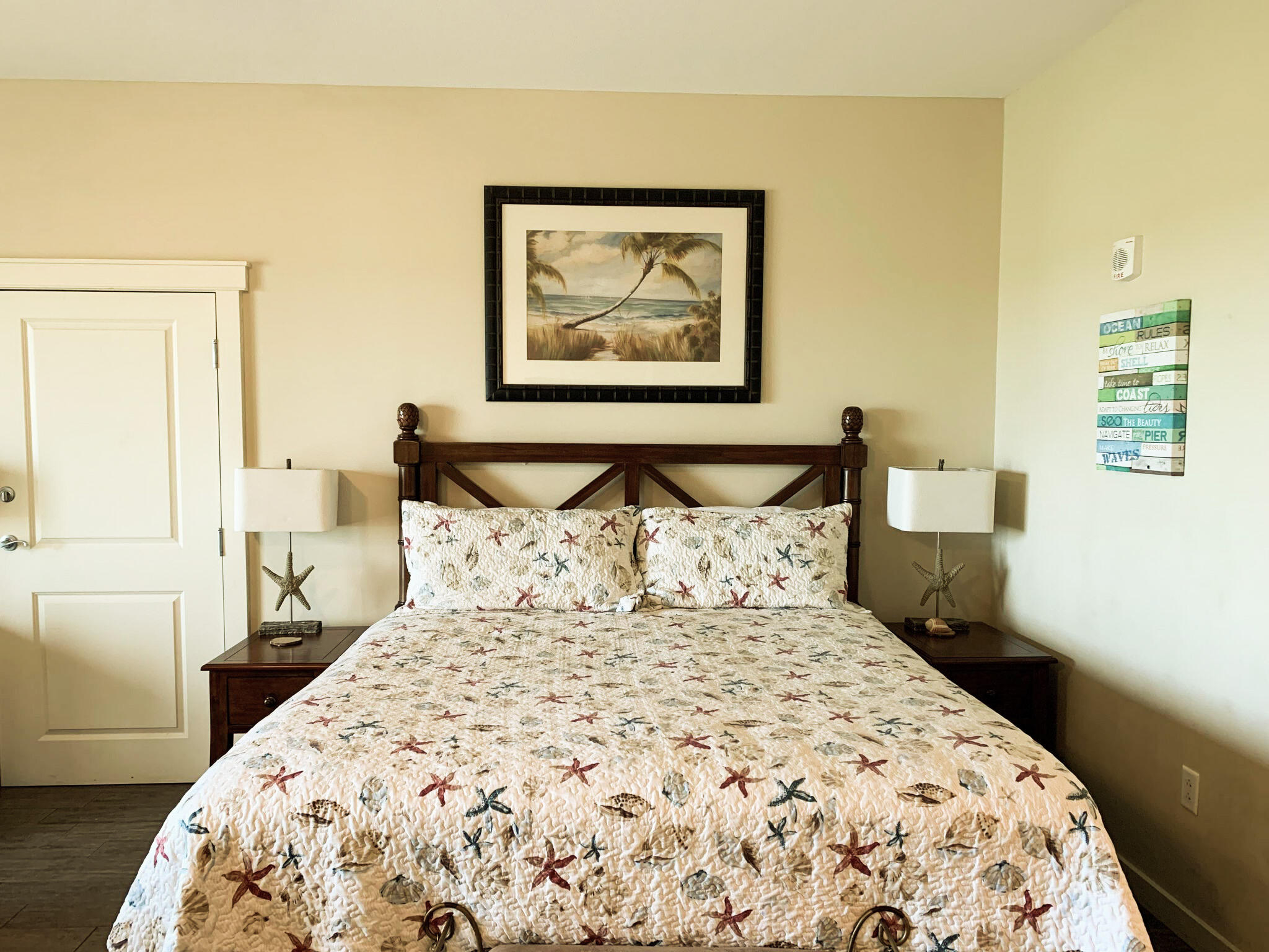 15100 Front Beach Road, Unit 919 921 Panama City Beach, FL 32413 - Photo 3 of 49 a bedroom with a large bed and a window