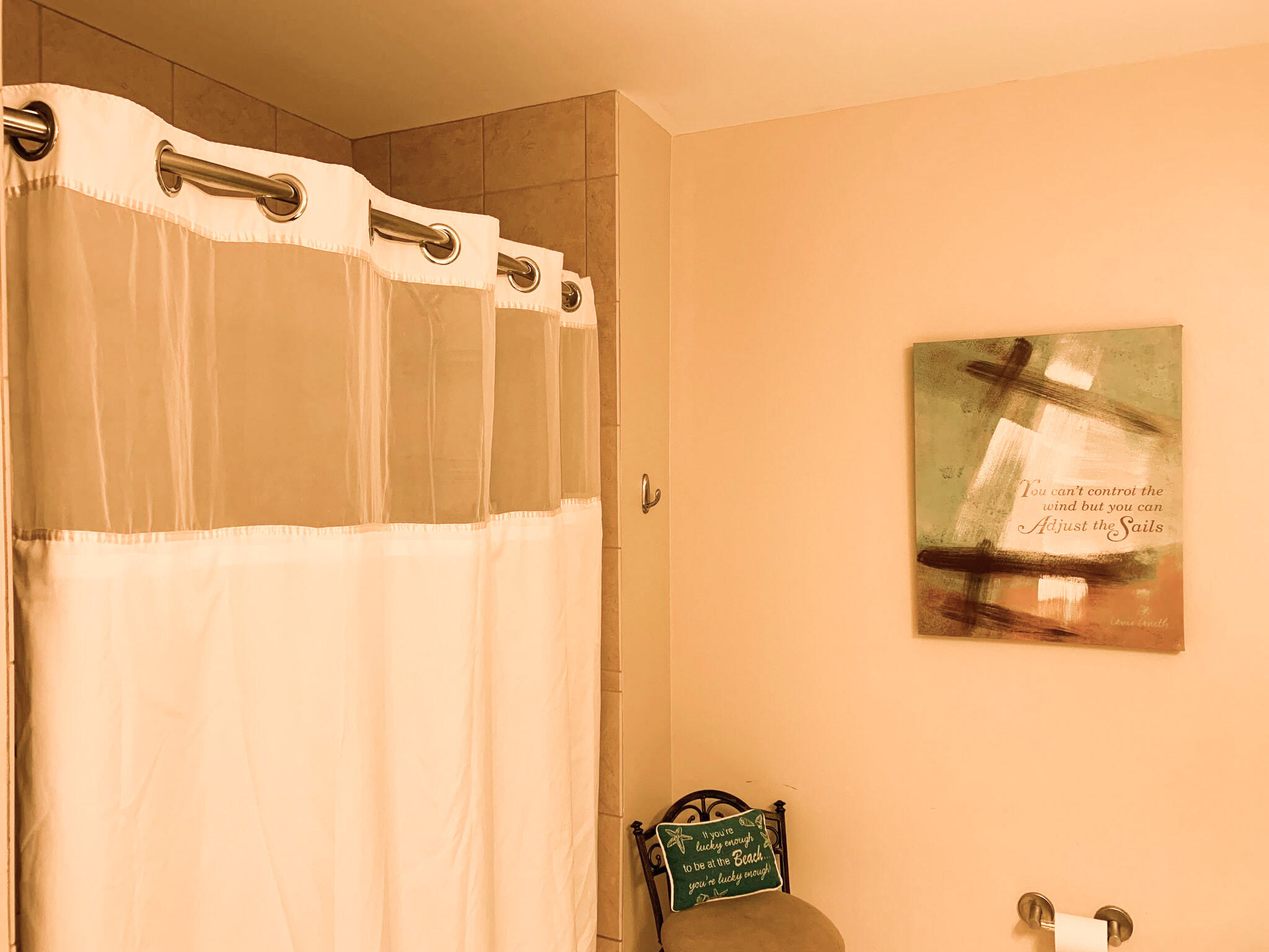 15100 Front Beach Road, Unit 919 921 Panama City Beach, FL 32413 - Photo 31 of 49 a bathroom with a shower curtain and a sink