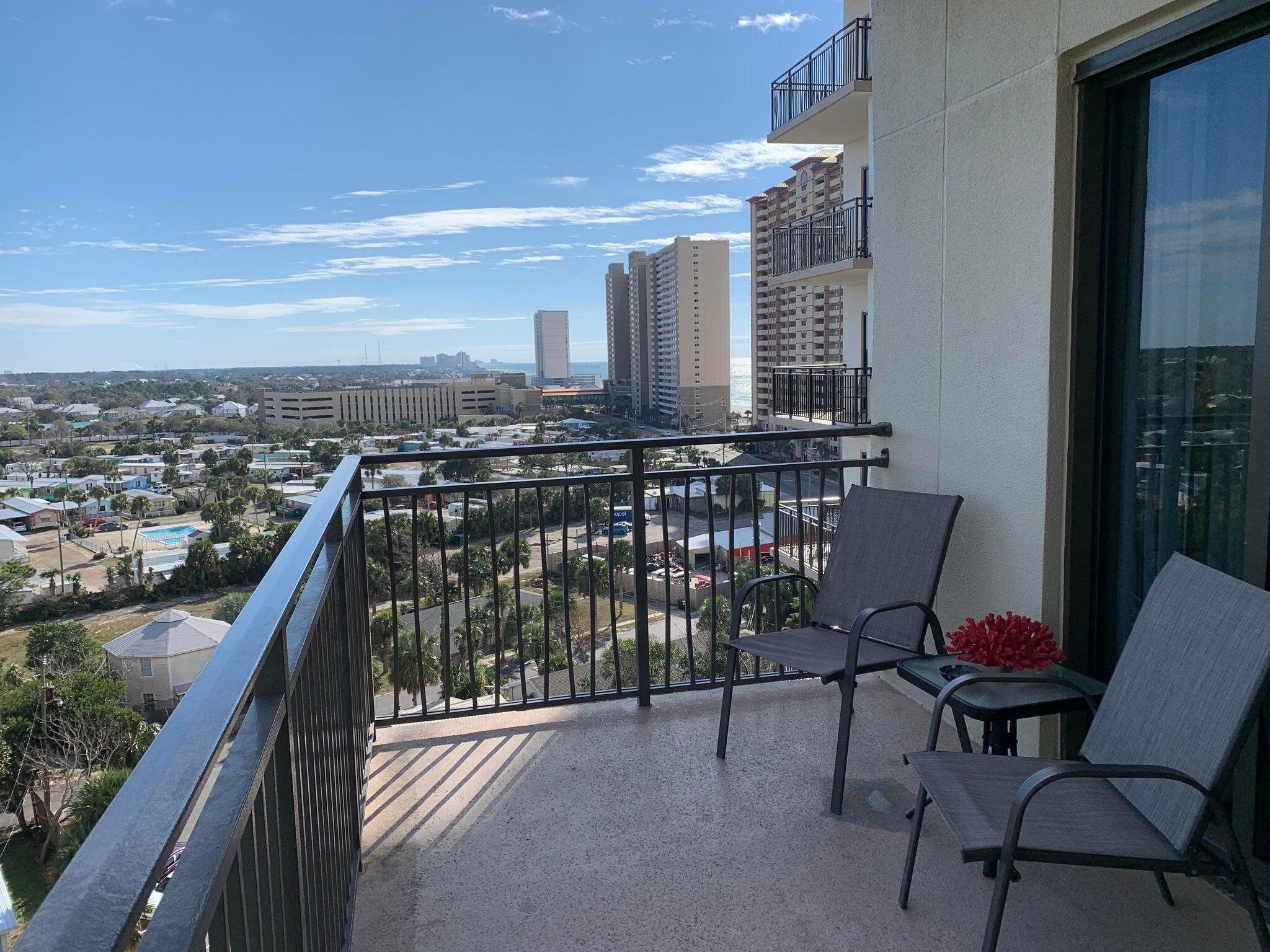 15100 Front Beach Road, Unit 919 921 Panama City Beach, FL 32413 - Photo 34 of 49 a view of a balcony with chairs