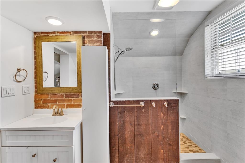 1226 Mayview Road Pittsburgh, PA 15241 - Photo 33 of 42 The en-suite bathroom offers comfort and convenience within your private retreat.