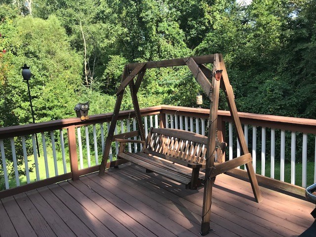 204 Ridge Point Way Macon, GA 31220 - Photo 12 of 22 a view of balcony with wooden floor and outdoor seating