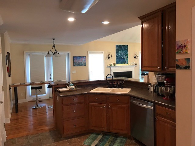 204 Ridge Point Way Macon, GA 31220 - Photo 13 of 22 a kitchen with a sink stove and cabinets
