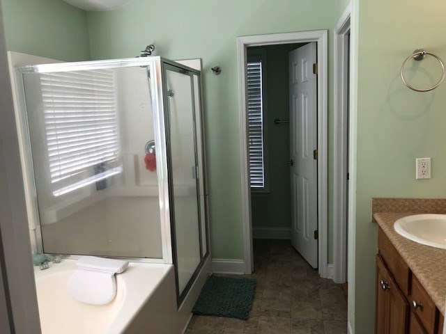 204 Ridge Point Way Macon, GA 31220 - Photo 17 of 22 a bathroom with a sink a toilet and shower