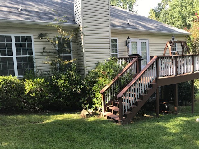 204 Ridge Point Way Macon, GA 31220 - Photo 19 of 22 a view of a house with a deck and a yard