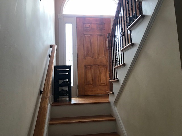 204 Ridge Point Way Macon, GA 31220 - Photo 4 of 22 a view of staircase with wooden floor and white walls