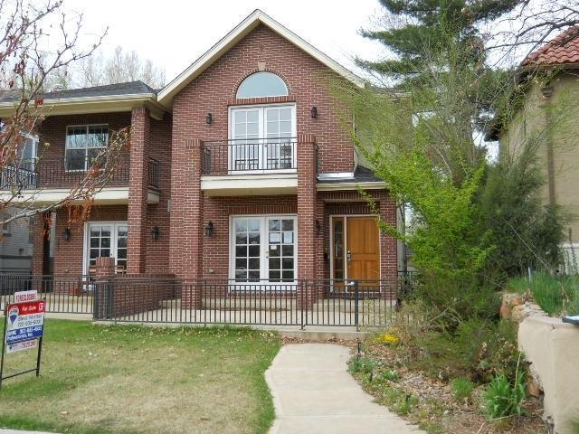 581 South Downing Street Denver, CO 80209 - Photo 1 of 1 a front view of a house with a garden