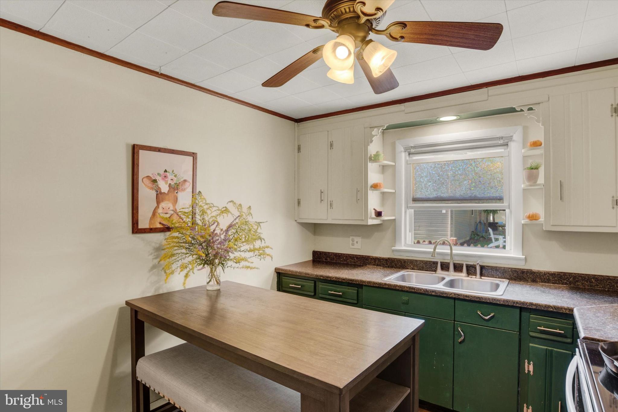 273 West Ridge Road Elizabethtown, PA 17022 - Photo 5 of 20 a kitchen with a table a sink and cabinets