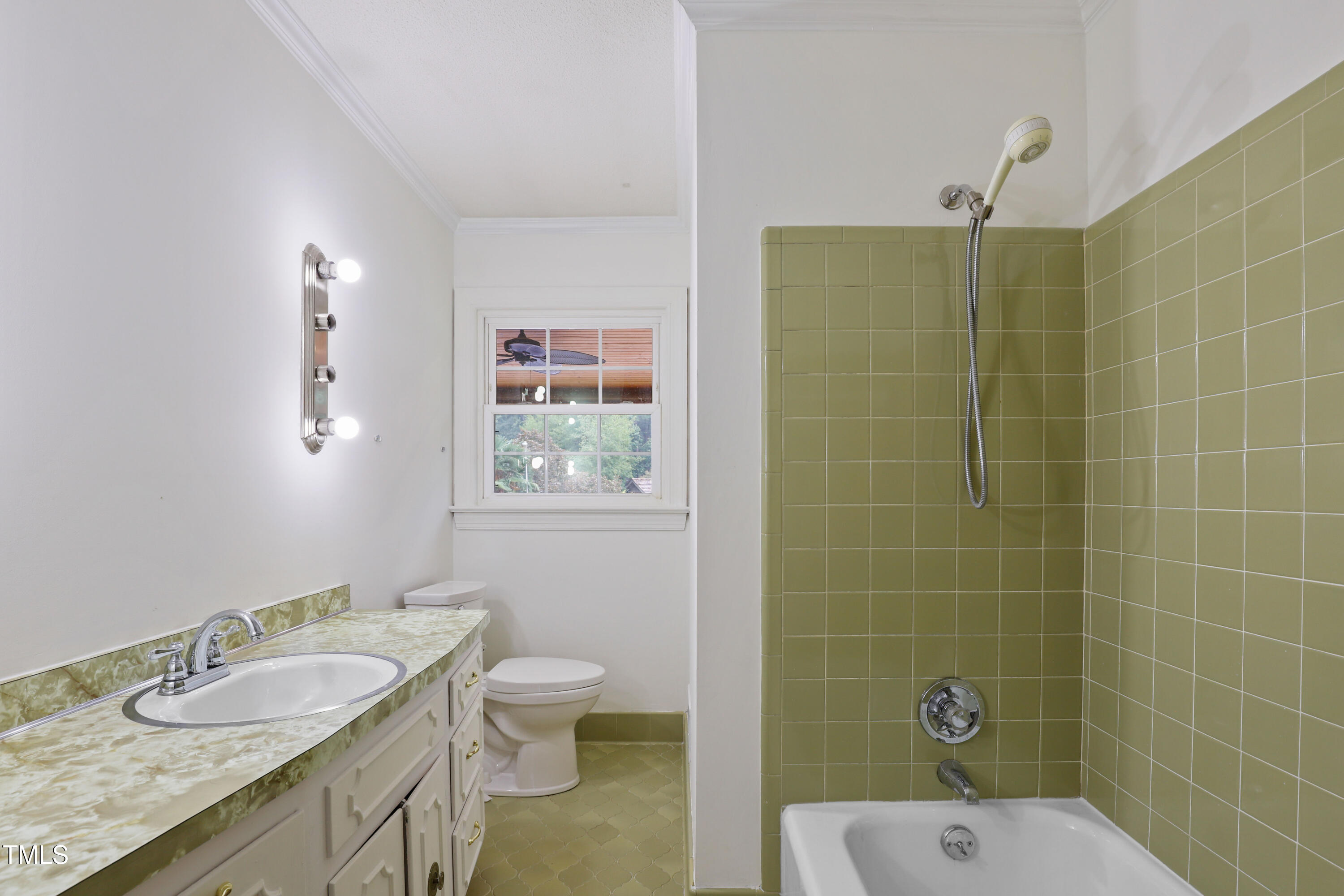 1204 Country Ridge Drive Raleigh, NC 27609 - Photo 11 of 49 a bathroom with a granite countertop sink toilet and shower