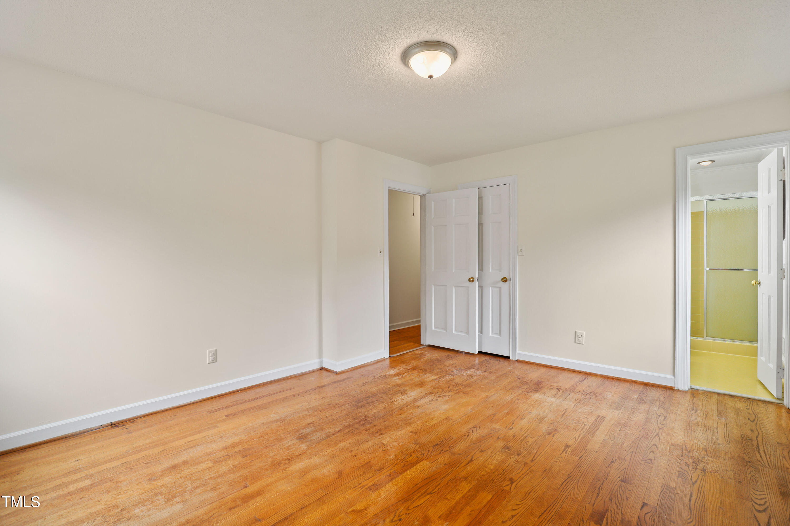 1204 Country Ridge Drive Raleigh, NC 27609 - Photo 13 of 49 wooden floor in an empty room