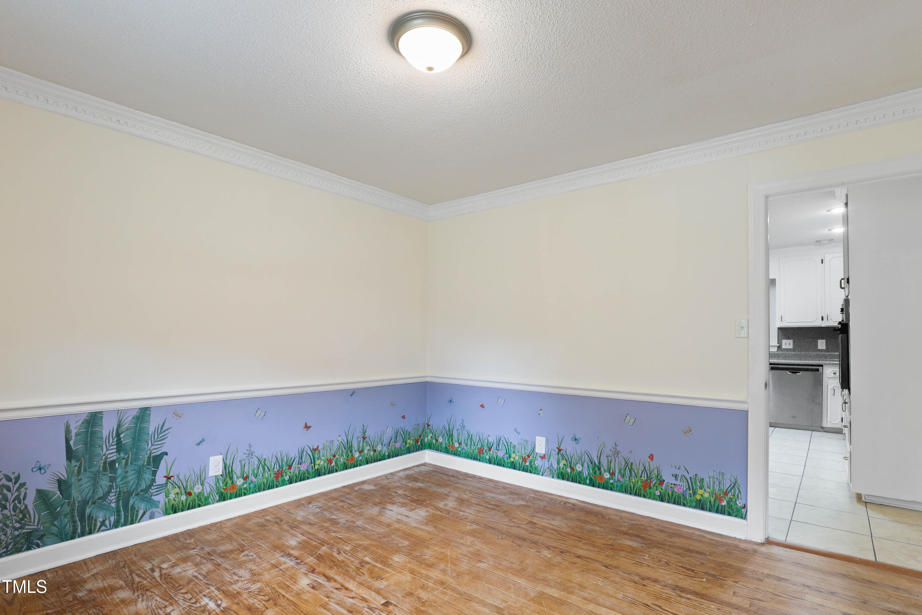 1204 Country Ridge Drive Raleigh, NC 27609 - Photo 20 of 49 a view of an empty room and kitchen