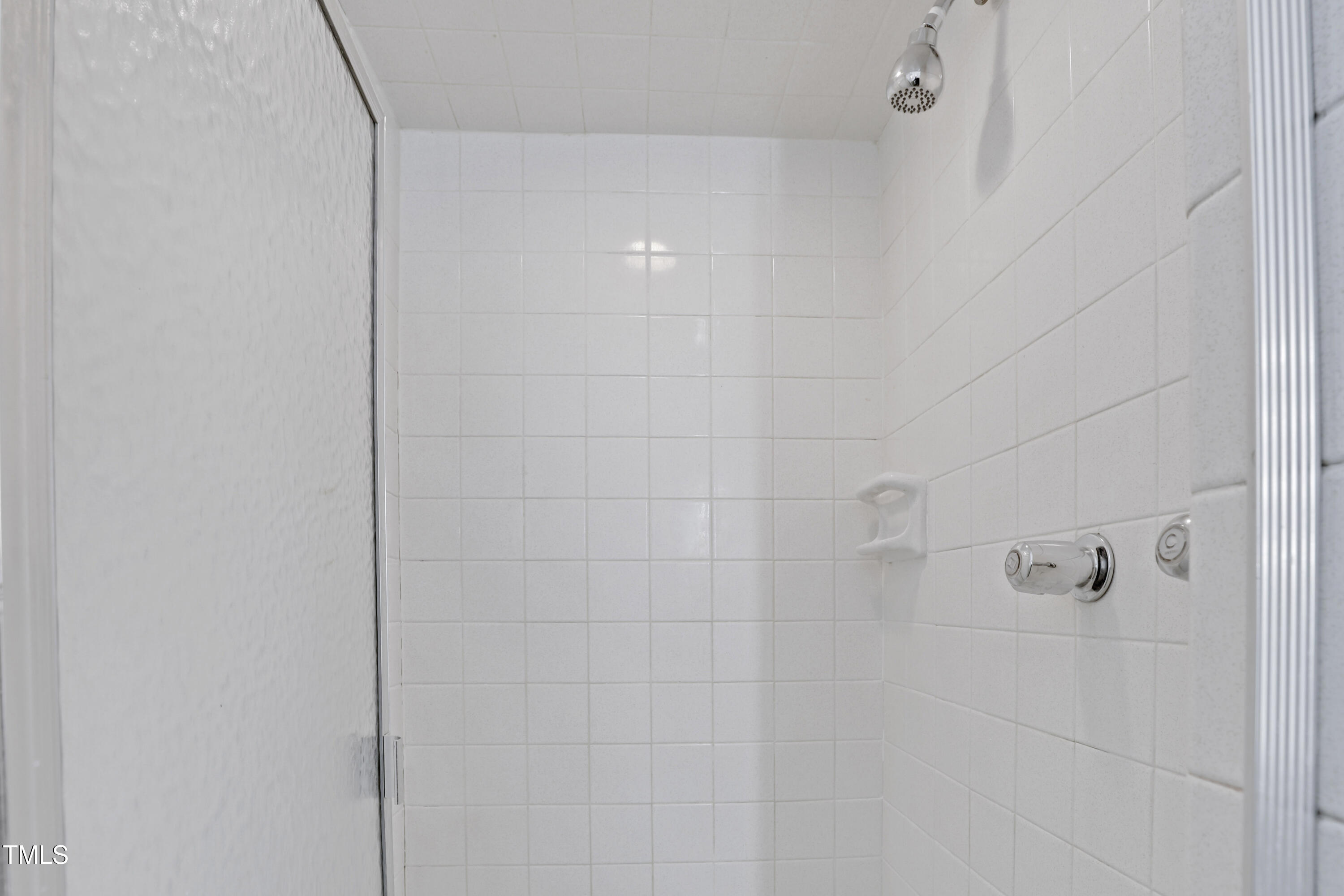 1204 Country Ridge Drive Raleigh, NC 27609 - Photo 26 of 49 a bathroom with a shower