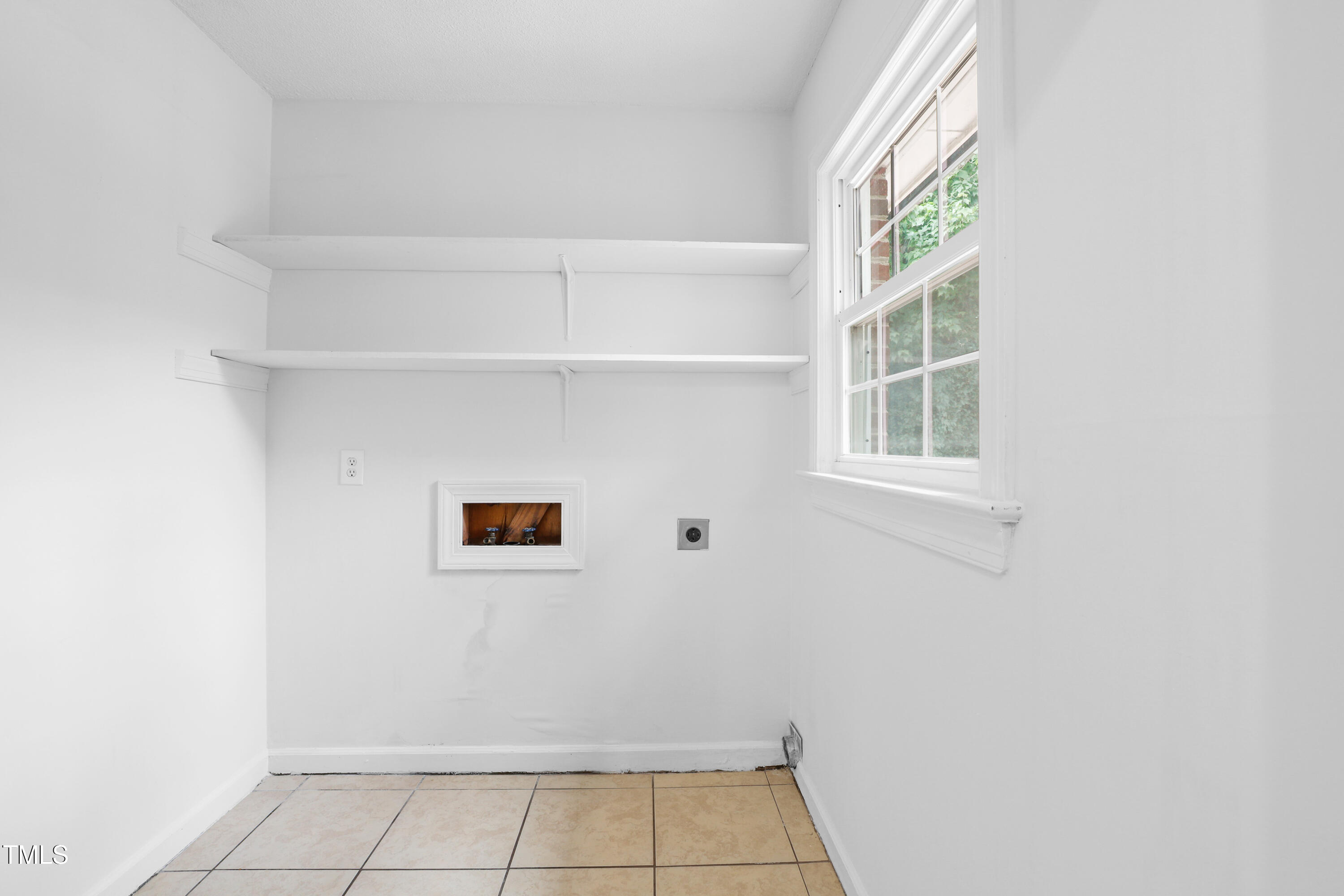 1204 Country Ridge Drive Raleigh, NC 27609 - Photo 29 of 49 an empty room with windows