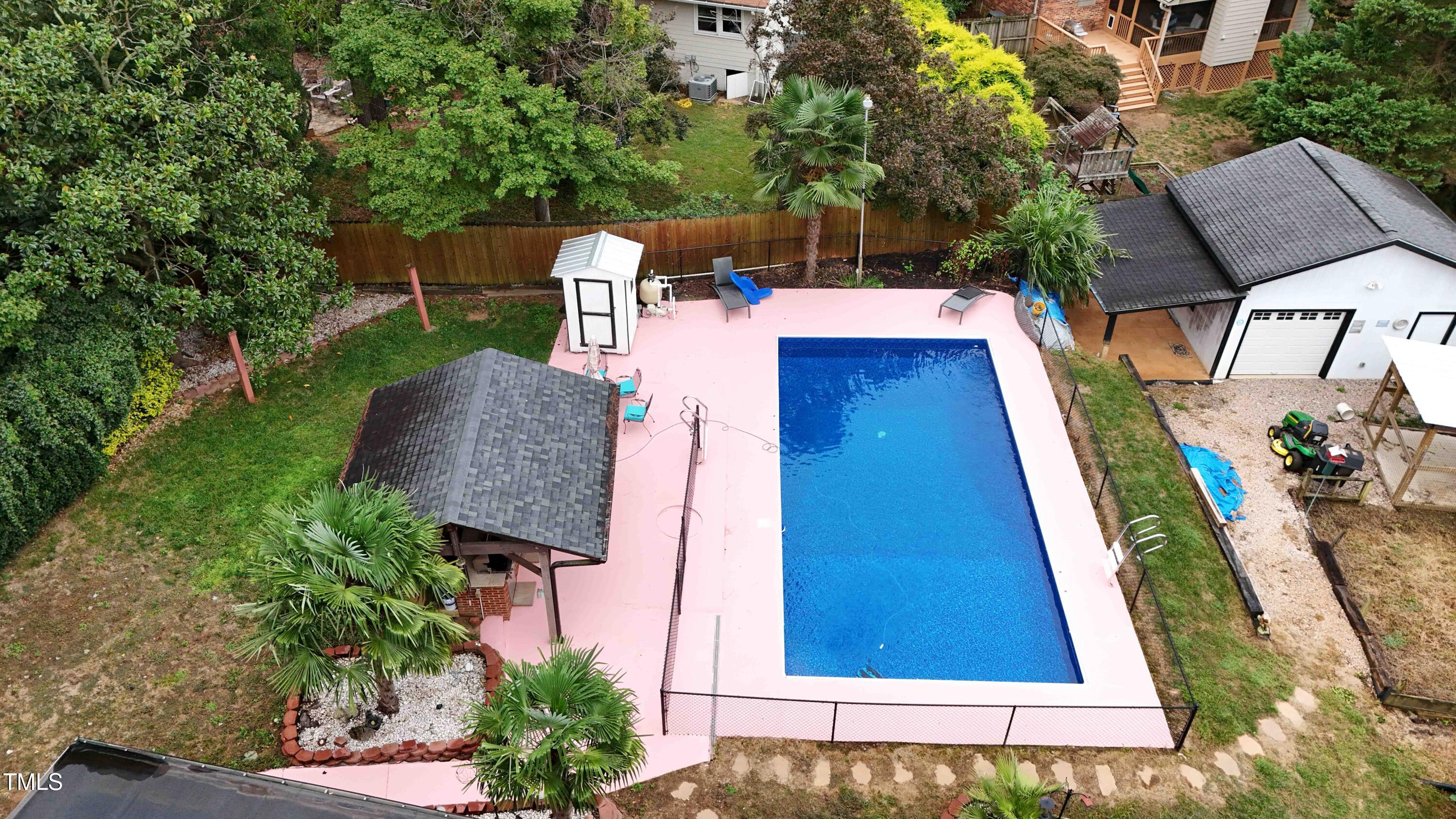 1204 Country Ridge Drive Raleigh, NC 27609 - Photo 45 of 49 swimming pool view with a seating space