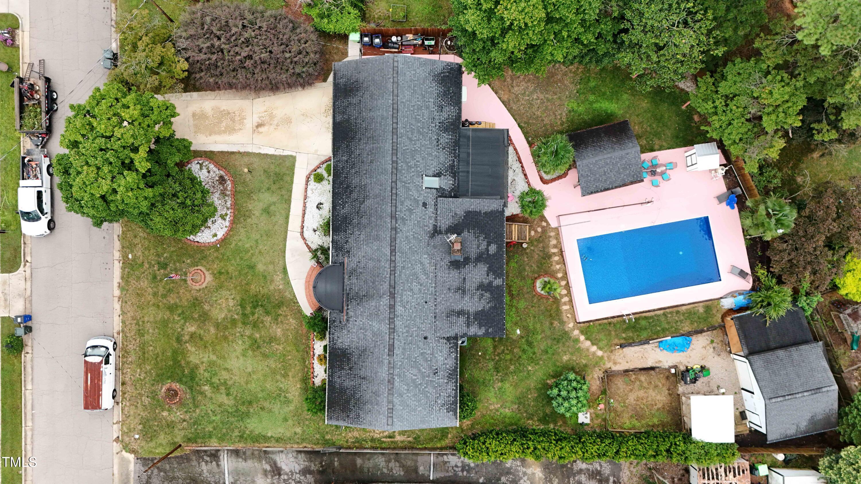 1204 Country Ridge Drive Raleigh, NC 27609 - Photo 46 of 49 an aerial view of a house with a yard and trees