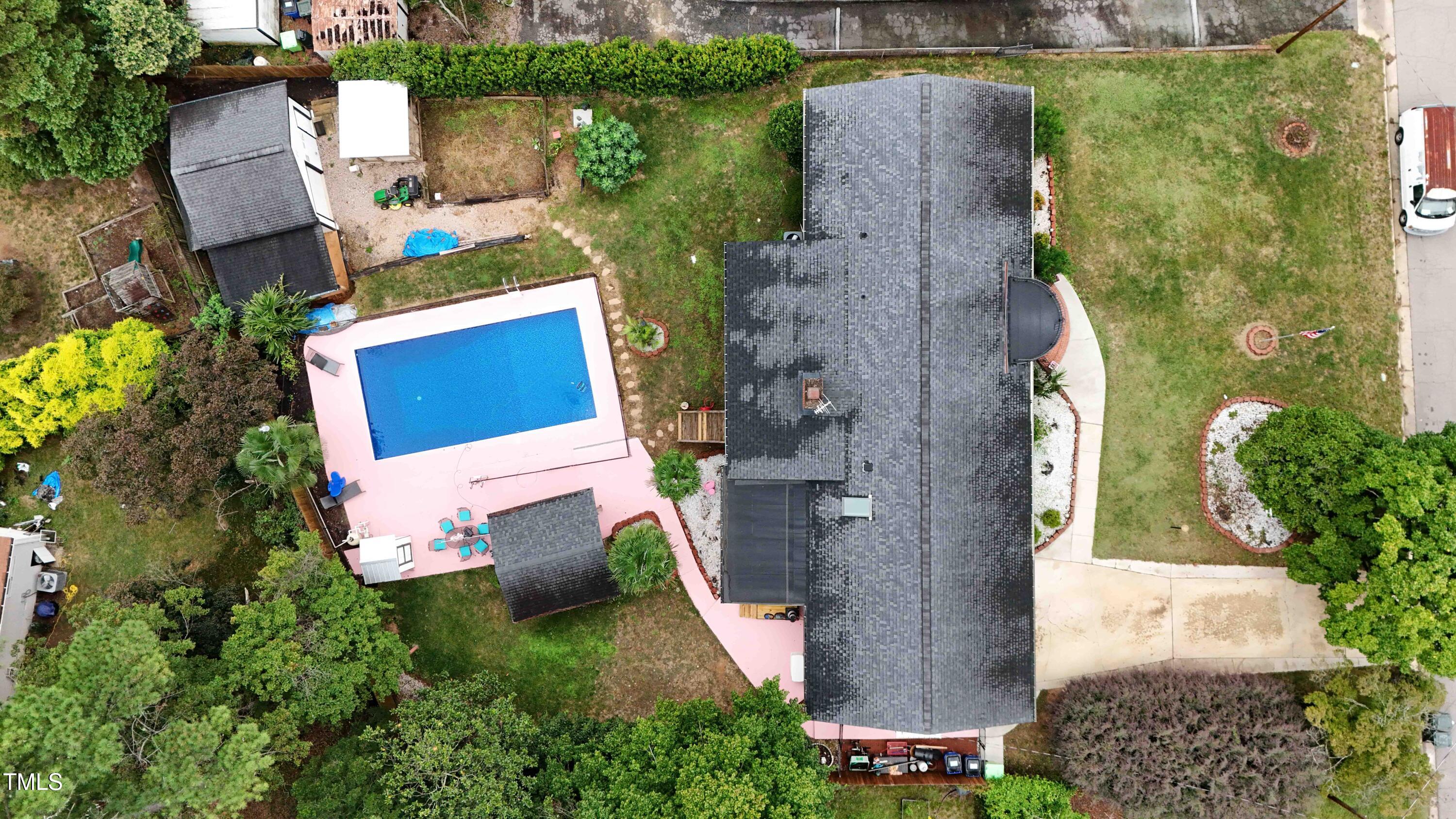 1204 Country Ridge Drive Raleigh, NC 27609 - Photo 47 of 49 an aerial view of a house with a yard