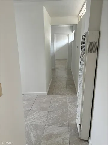 a view of hallway with shower
