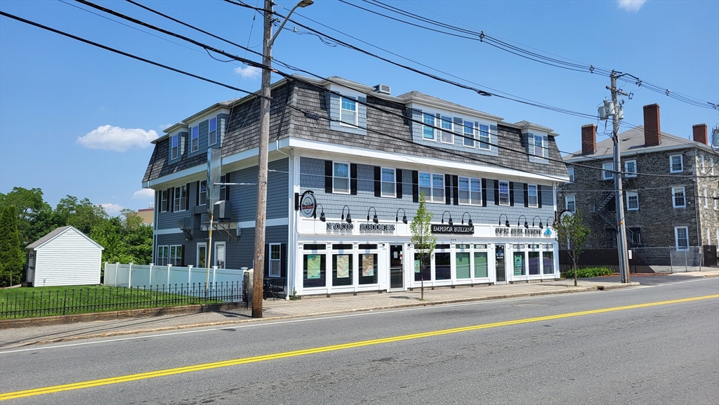 front view of a building with a street
