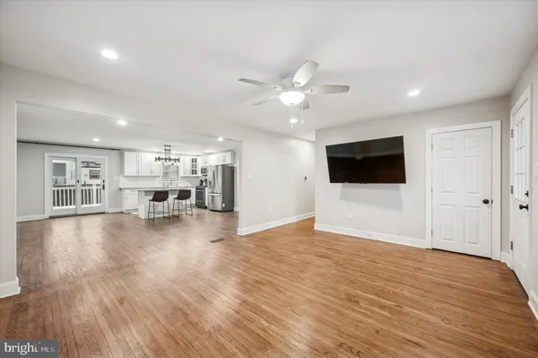 a view of a livingroom with a flat screen tv and fireplace