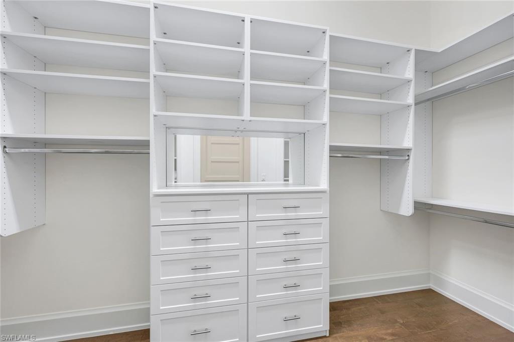 3200 Crayton Road Naples, FL 34103 - Photo 15 of 30 a view of an empty walk in closet