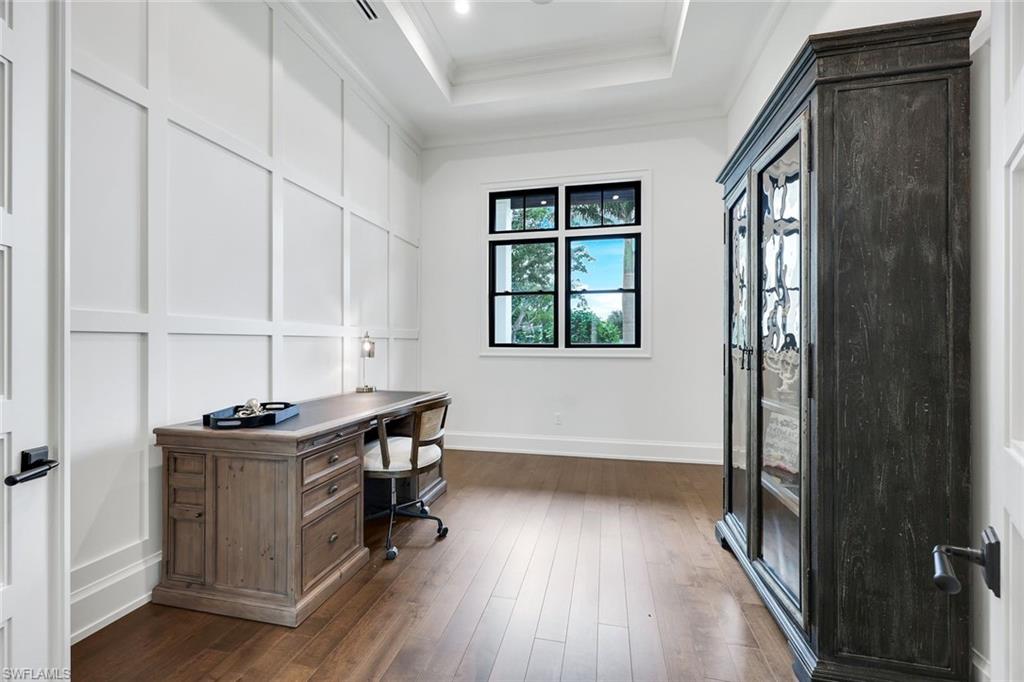 3200 Crayton Road Naples, FL 34103 - Photo 23 of 30 a view of a workspace with furniture and window