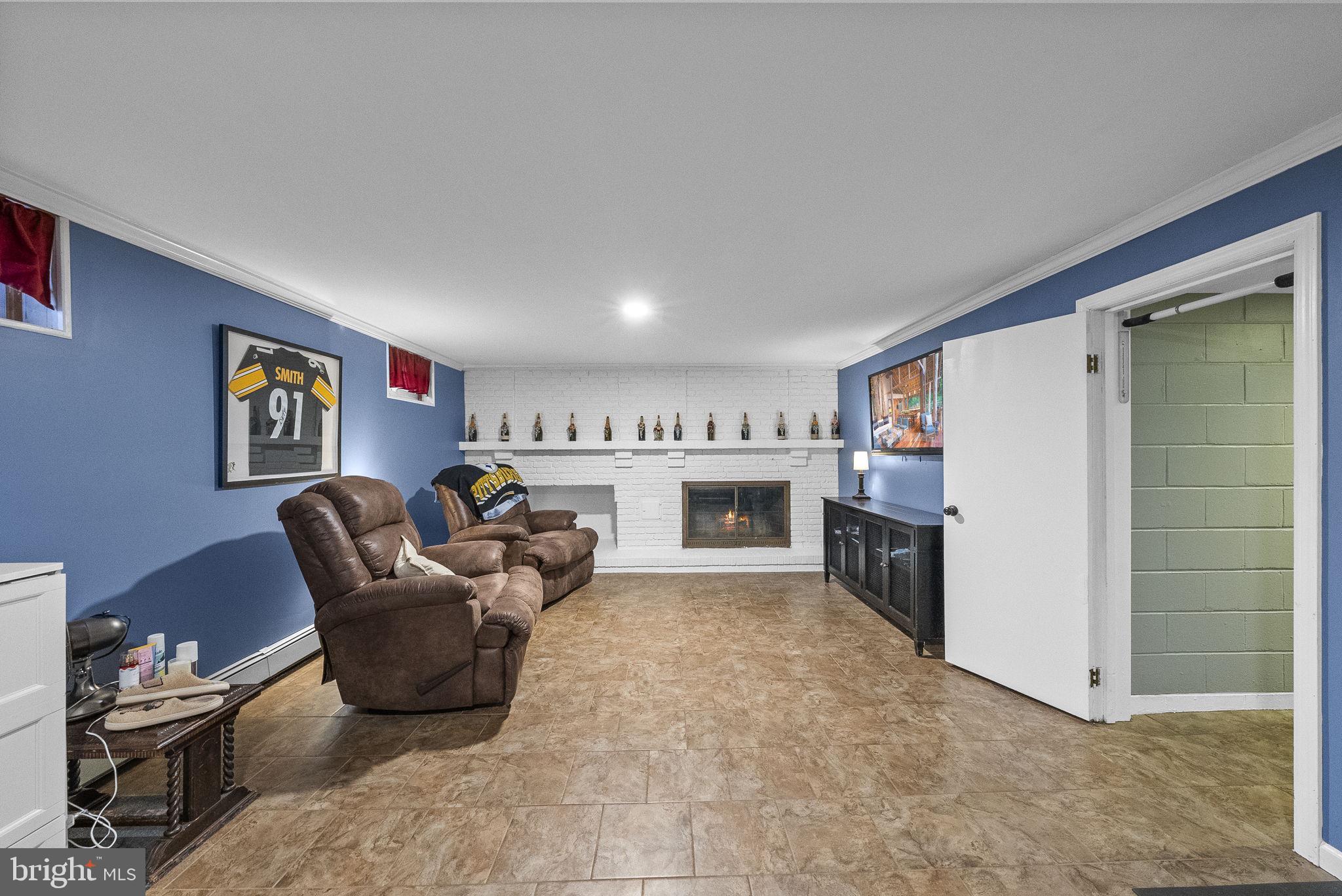 247 Washington Crossing Pennington Road Titusville, NJ 08560 - Photo 16 of 53 a bed room with furniture and a fireplace