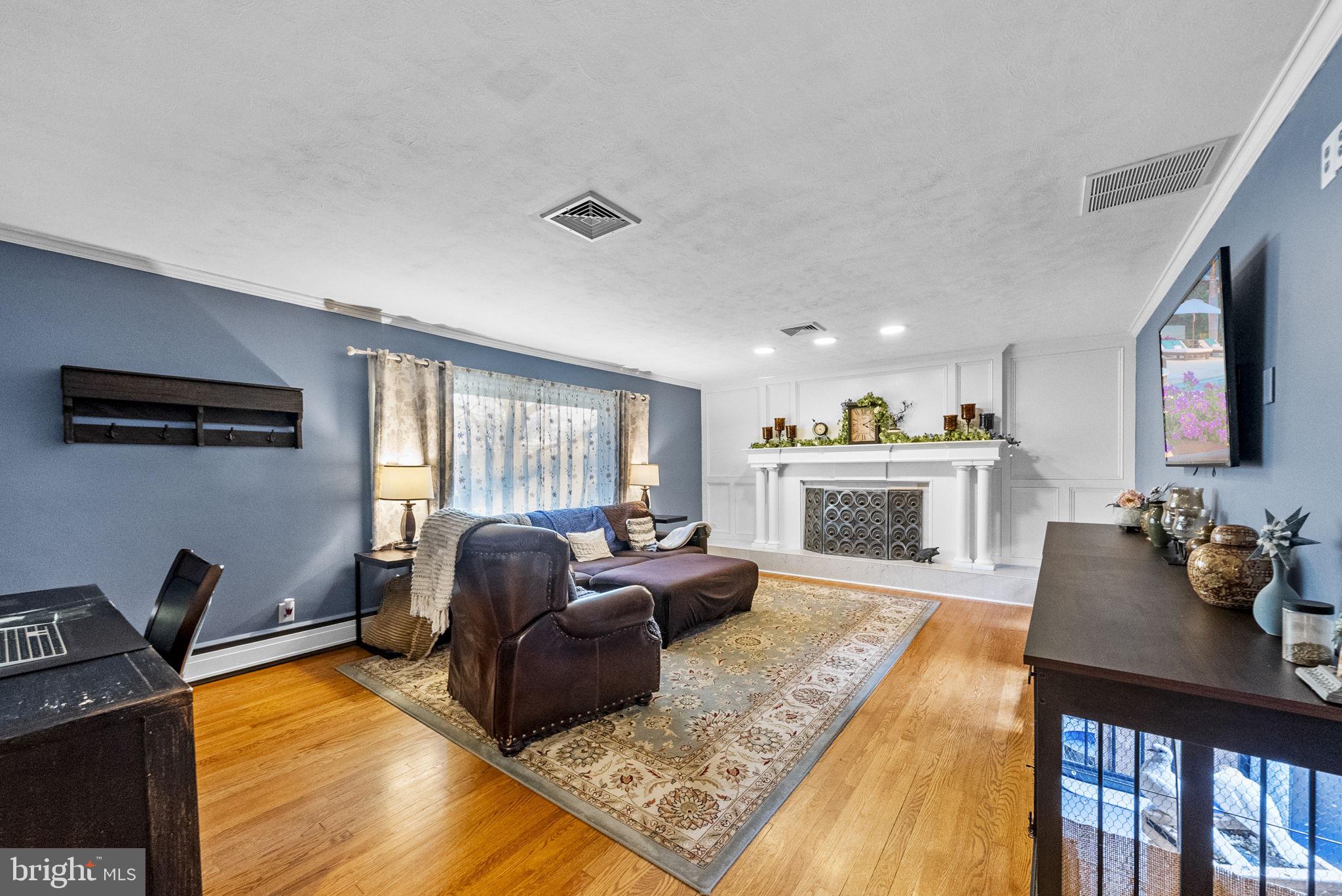 247 Washington Crossing Pennington Road Titusville, NJ 08560 - Photo 23 of 53 a living room with furniture fireplace and flat screen tv