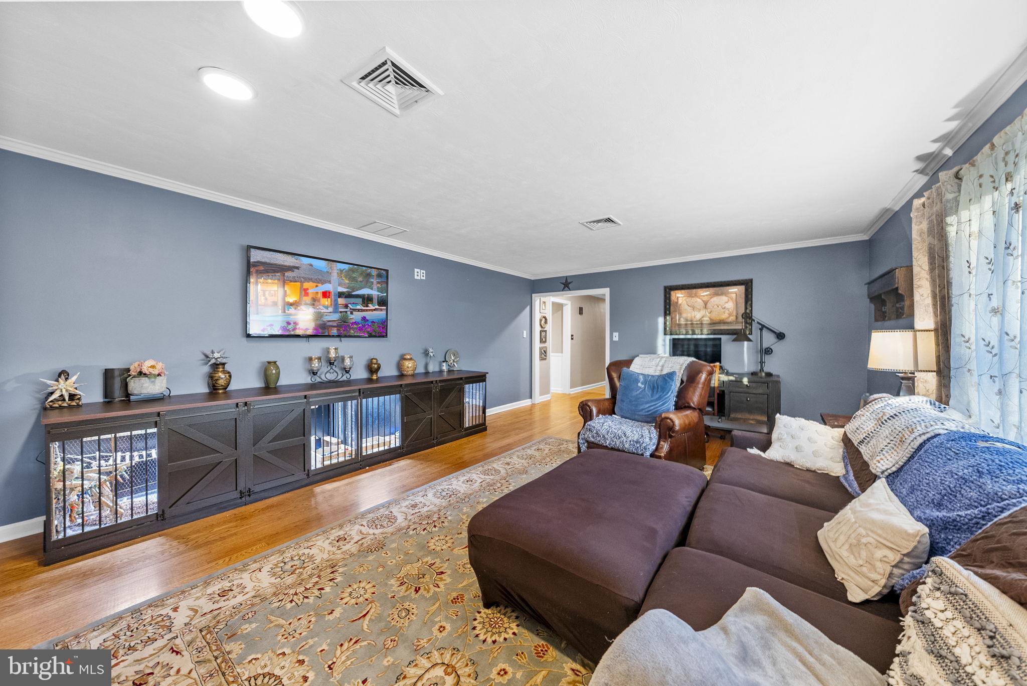 247 Washington Crossing Pennington Road Titusville, NJ 08560 - Photo 24 of 53 a living room with furniture and a flat screen tv